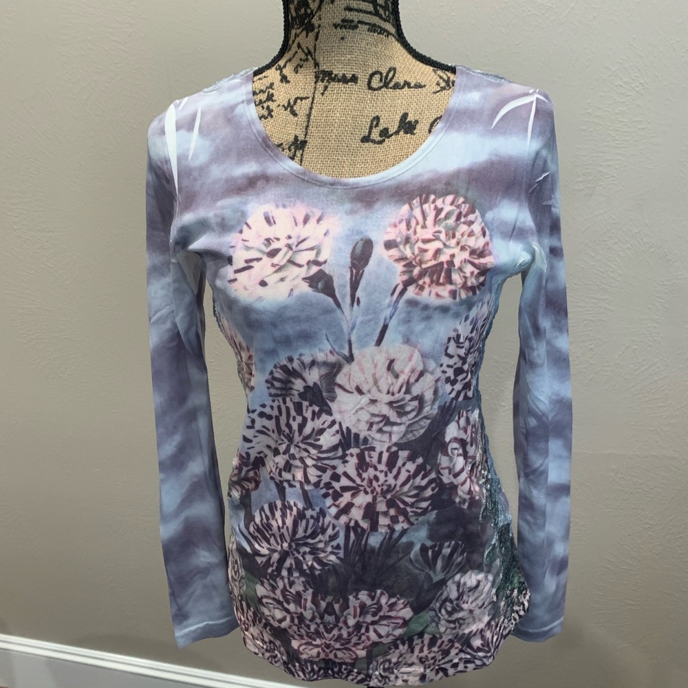 AZI top. Light blue with lace in back long sleeve size small. Good condition